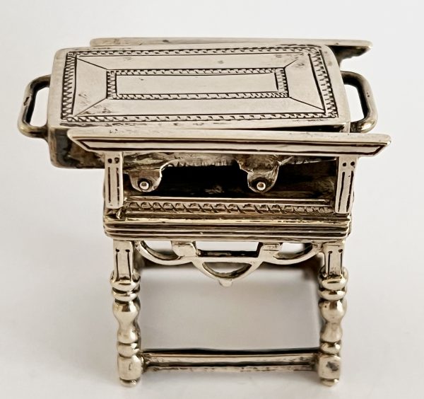 Antiek zilveren miniatuur van een mangel 1865